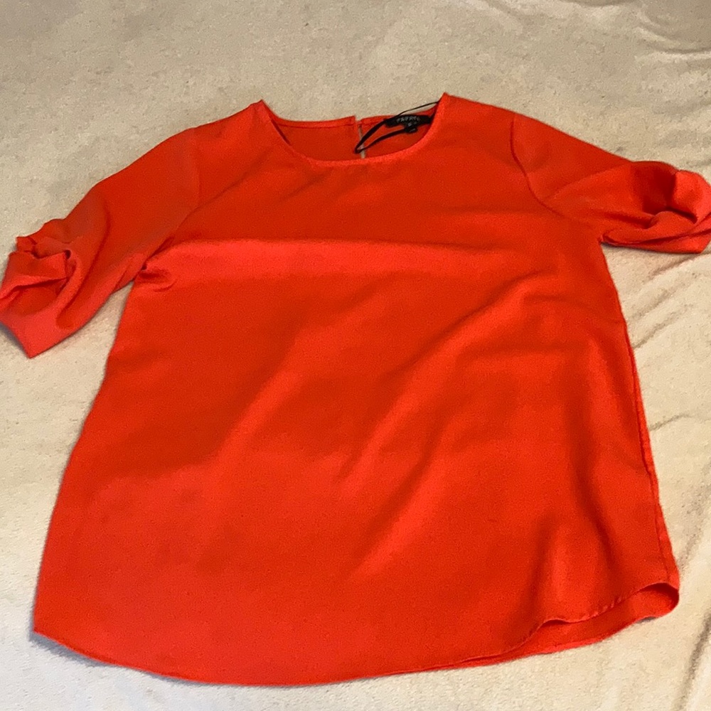 Neon orange blouse